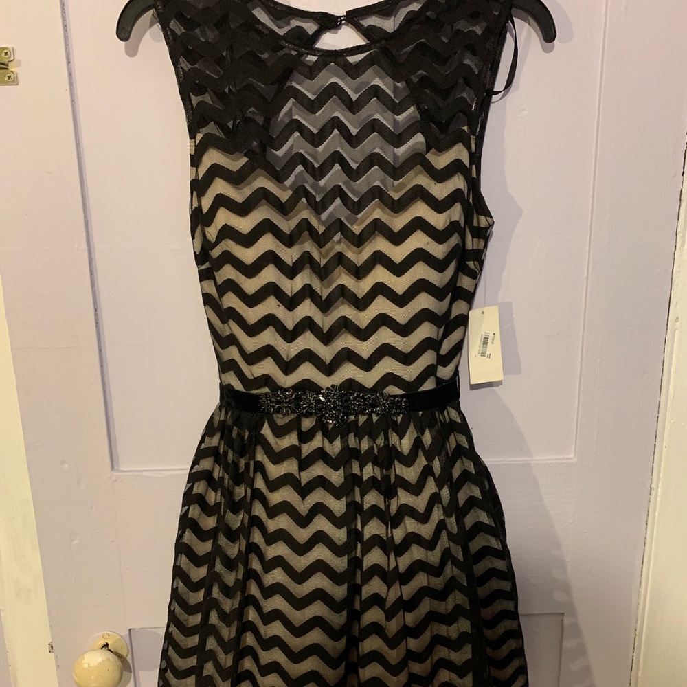 Semi formal dress. NEVER BEEN WORN, TAGS STILL ON